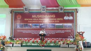 Kepala Bappeda Nias Barat Menyampaikan  Laporan Pada pembukaan Musrenbang RKPD Kabupaten Nias Barat Tahun 2022.